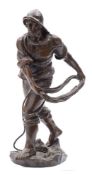 After Antoine Bofill (Spanish 1875-1925) a bronze sculpture of a fisherman casting a drag anchor: