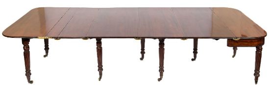 A Regency mahogany and inlaid concertina action extending dining table:,