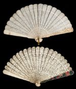 A 19th century Cantonese ivory brise fan: carved to both sides with figures in a pagoda landscape,
