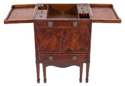 An early 19th Century mahogany and inlaid enclosed dressing table:,