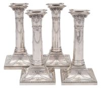A set of four Victorian silver candlesticks, maker Thomas Bradbury & Sons, London,