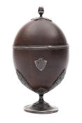 An early 19th century silver mounted coconut cup: inscribed,