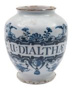 A pair of London blue and white delftware dry drug jars: each painted with an elaborate strapwork
