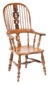 A Victorian elm and yew-wood stick back Windsor elbow chair:,