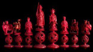 A late 19th Century Cantonese export carved Ivory figural chess set: one side stained red,