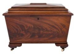 A Victorian mahogany sarcophagus shaped cellarette:, with a hinged top and interior divisions,