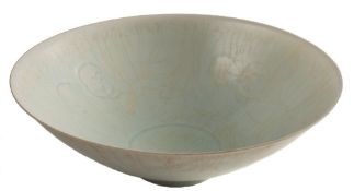 A Chinese Qingbai porcelain bowl: of flared conical form, covered in a pale blue crackled glaze,