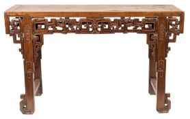 A Chinese carved wood altar table:, with a rectangular top,