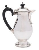 A George V silver hot water jug, maker RR, Birmingham, 1913: of plain baluster form,