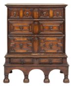 A 17th Century oak chest on stand:,
