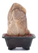 A Chinese scholar's rock: the stone of mottled grey and cream colour,