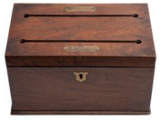 A 19th century mahogany and brass inlaid stationery box: the hinged lid with two slits for
