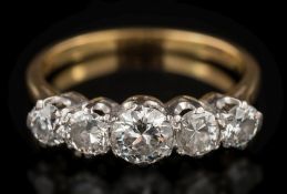 A graduated diamond five-stone ring: the round old, brilliant-cut diamonds approximately 0.20ct, 0.