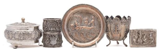 A Burmese silver bowl and cover: with embossed figural decoration, raised on three swept feet,