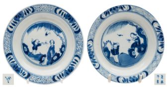 Two Chinese porcelain plates: each painted in blue with a mother and child beneath a willow tree