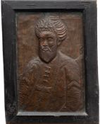 A Persian embossed copper relief plaque: depicting Sultan Mahmud Mirza,