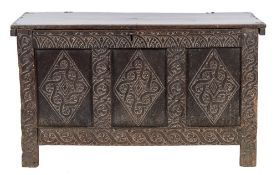 An early 18th Century oak rectangular coffer:, with a plain hinged top,