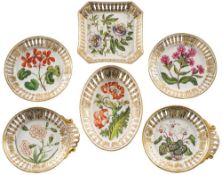 A fine early 19th century Coalport botanical part dessert service: painted with named botanical