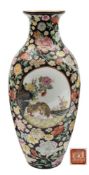 A Chinese famille noire millefleur medallion vase: of slender ovoid form,
