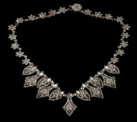 An early 19th century fringe necklace: composed of faceted steel rosette studs interspersed with