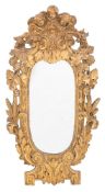 A 19th Century Continental carved giltwood and gesso oval mirror:,