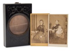 Carte de Visite : ebony viewer with circular 7 cms magnifying lens, 135 x 90 mm, c1860s.