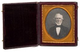 Photographic Institution, London a 1/6th plate daguerreotype portrait of bearded man:, hand tinted,
