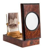 A late Victorian walnut magnifier/stereoscope viewer:,