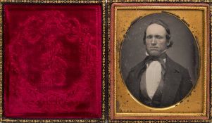 A 1/6th plate daguerreotype portrait of man with neckerchief:, hand tinted,