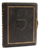 An Edwardian black leather photograph album containing twelve photographs of Worcester:,