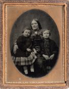 A Victorian 1/4 plate ambrotype portrait of a Scottish family of a mother and her two children:,