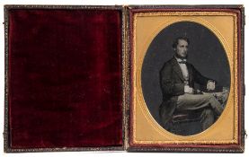A mid 19th century hand tinted ambrotype portrait of a gentleman:, photographer unknown,