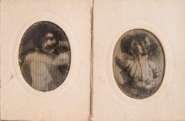 Two early 20th century celluloid two-way pictures of female nudes:, both in oval card frames, 7.