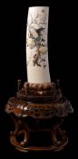 A pair of Japanese ivory and shibayama-style tusk vases: each inlaid in mother of pearl and horn