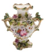 A mid 19th century English flower encrusted miniature two-handled vase: painted with floral