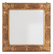 A carved giltwood and gesso mirror:, of square outline,