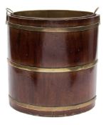 An 18th century walnut and brass bound bucket: of navette-shaped outline, 37cm. high.