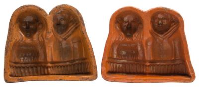 Two late 19th century French earthenware 'marriage' cake moulds: in glazed redware,