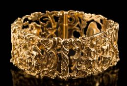 A 14ct gold panel-link bracelet: the links cast with openwork scenes of figures in Rococo-style