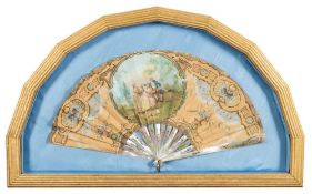 A 19th century English mother of pearl fan: the paper leaf with a central cartouche decorated with