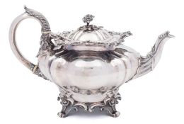 A William IV silver teapot, maker Charles Gordon, London, 1835: of squat lobed form,