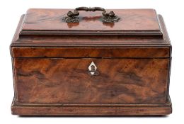 A George III mahogany tea caddy: with pagoda top, brass scroll handle and divided interior,