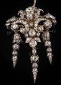 A late 19th century gold, silver and diamond brooch pendant: of openwork foliate design,