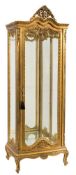 A Contemporary Continental carved giltwood vitrine:,