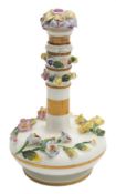 A Rockingham scent bottle and stopper: of compressed globular form with long slender neck,