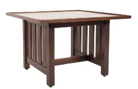 An Arts and Crafts oak square occasional table:,