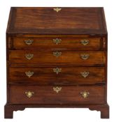 A George III mahogany bureau:,