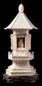 A Japanese ivory veneered model of a shrine: of hexagonal form with lotus bud finial,