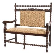 A carved walnut settee in the 17th Century taste:,