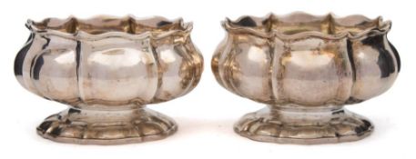 A pair of George IV silver salts, maker James Arthur, London, 1826: of lobed circular form,